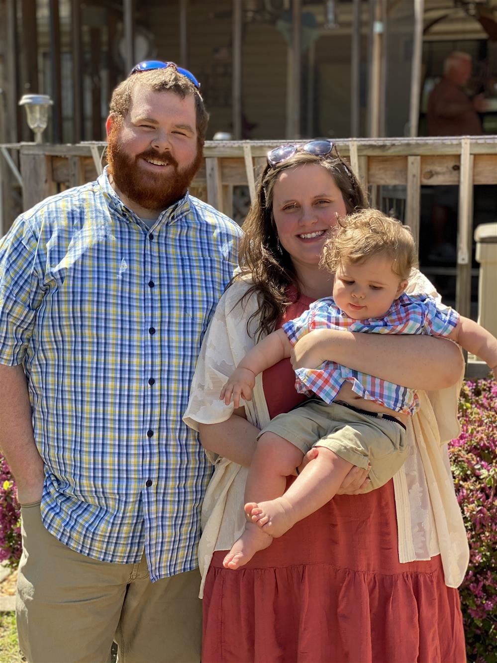  Family picture of Mrs. Blackmon with her husband, Quintin, and their son, Walker
